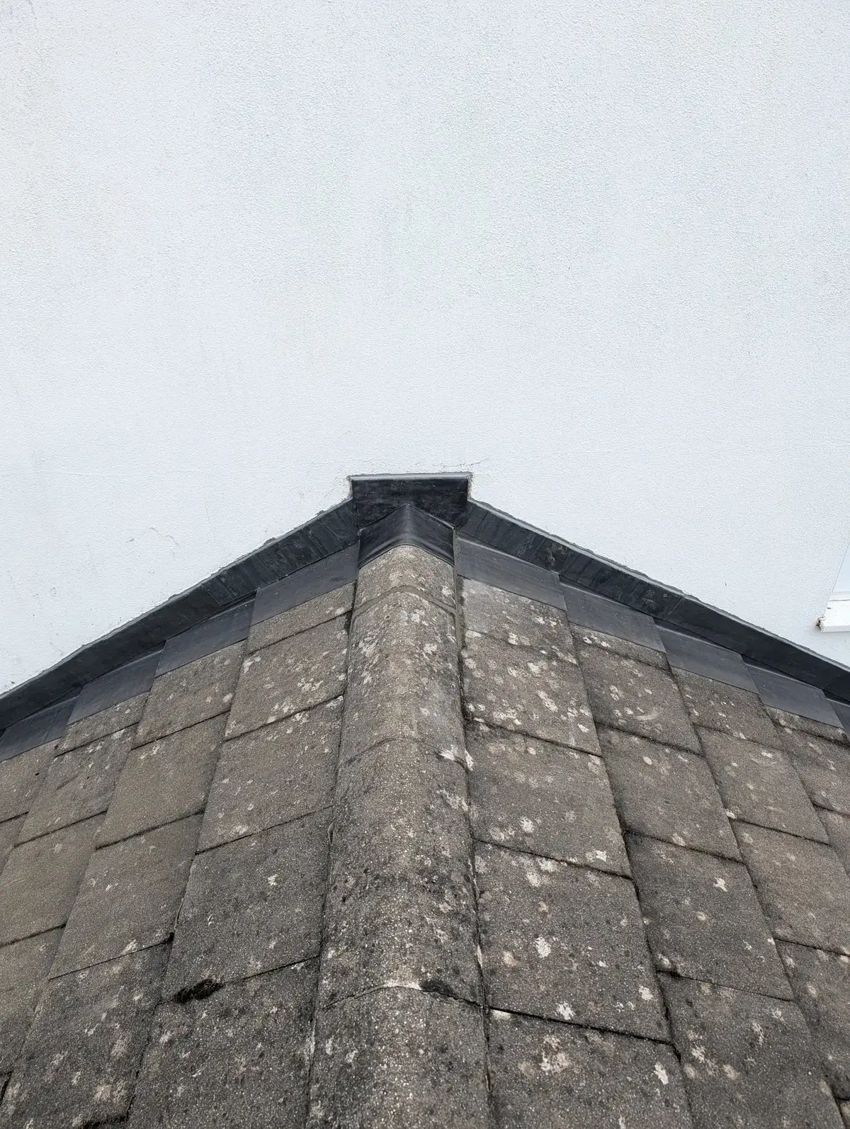 Lead-dressed hip on a slate roof