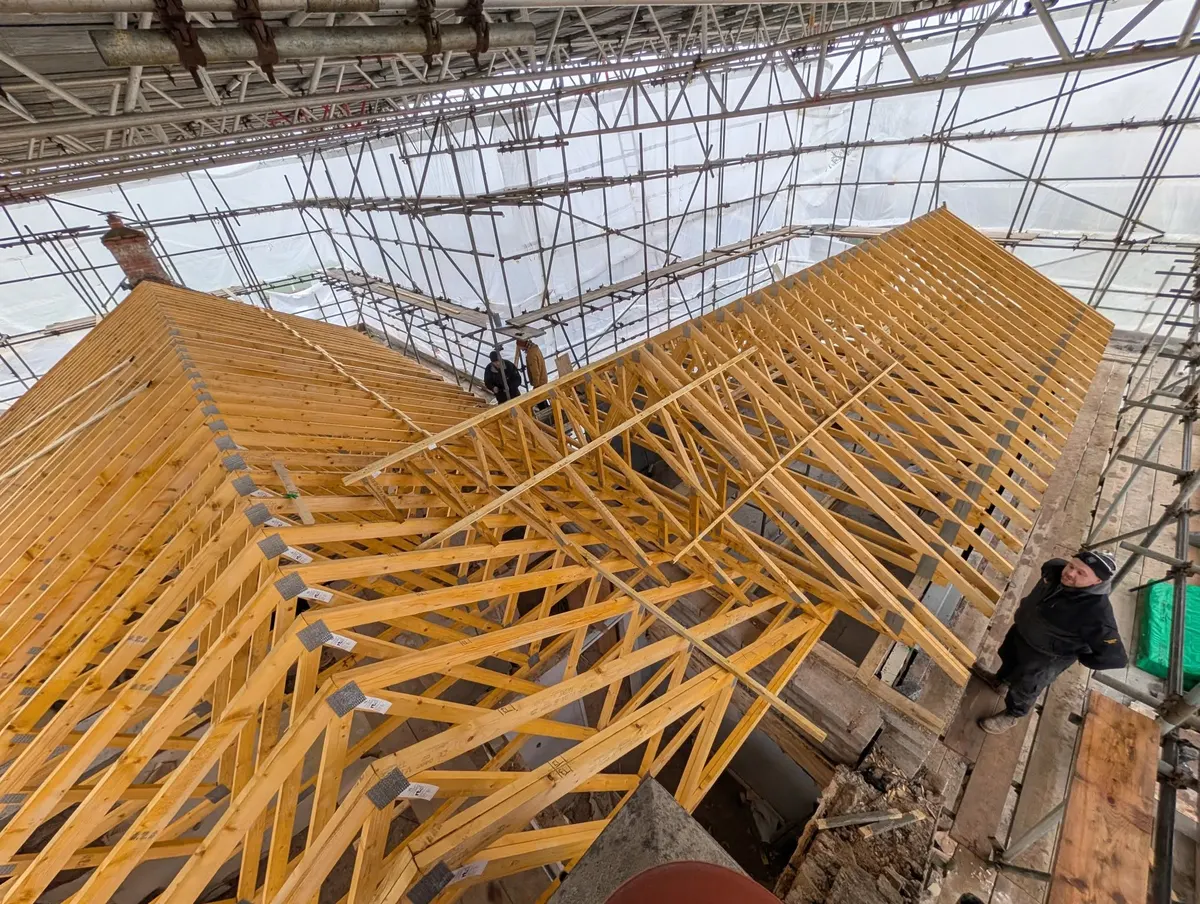 New timber trusses under scaffold cover