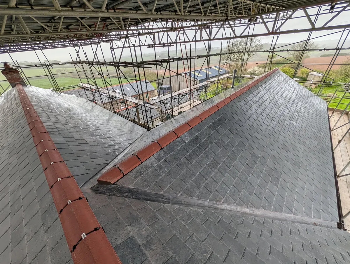 Natural slate with red ridge tiles