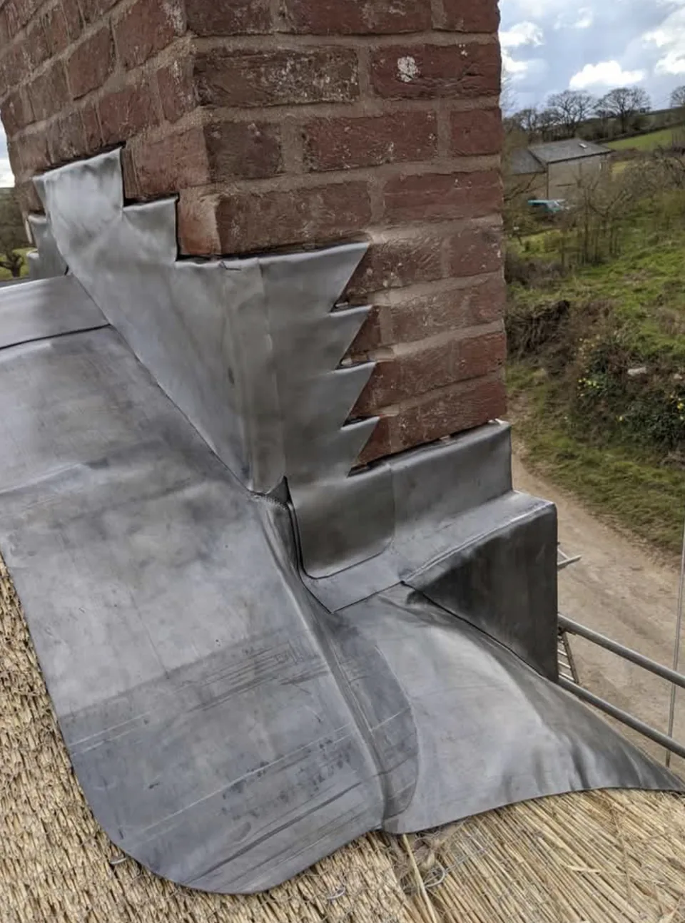 Lead chimney flashing on thatch, another angle